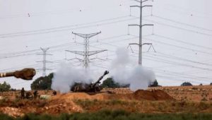 On October 8, 2023, an artillery unit fires close to the Israeli border with the Gaza Strip.