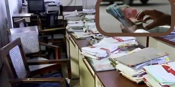 Image of office and cash in hands