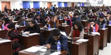 Image show students busy in Exams